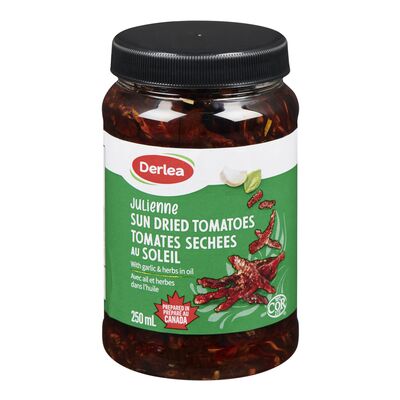 Tomates séchées au soleil avec ail et fines herbes dans l'huile