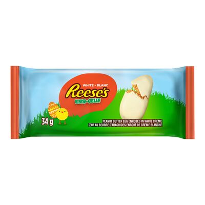 Oeufs au beurre d’arachide enrobés de crème blanche