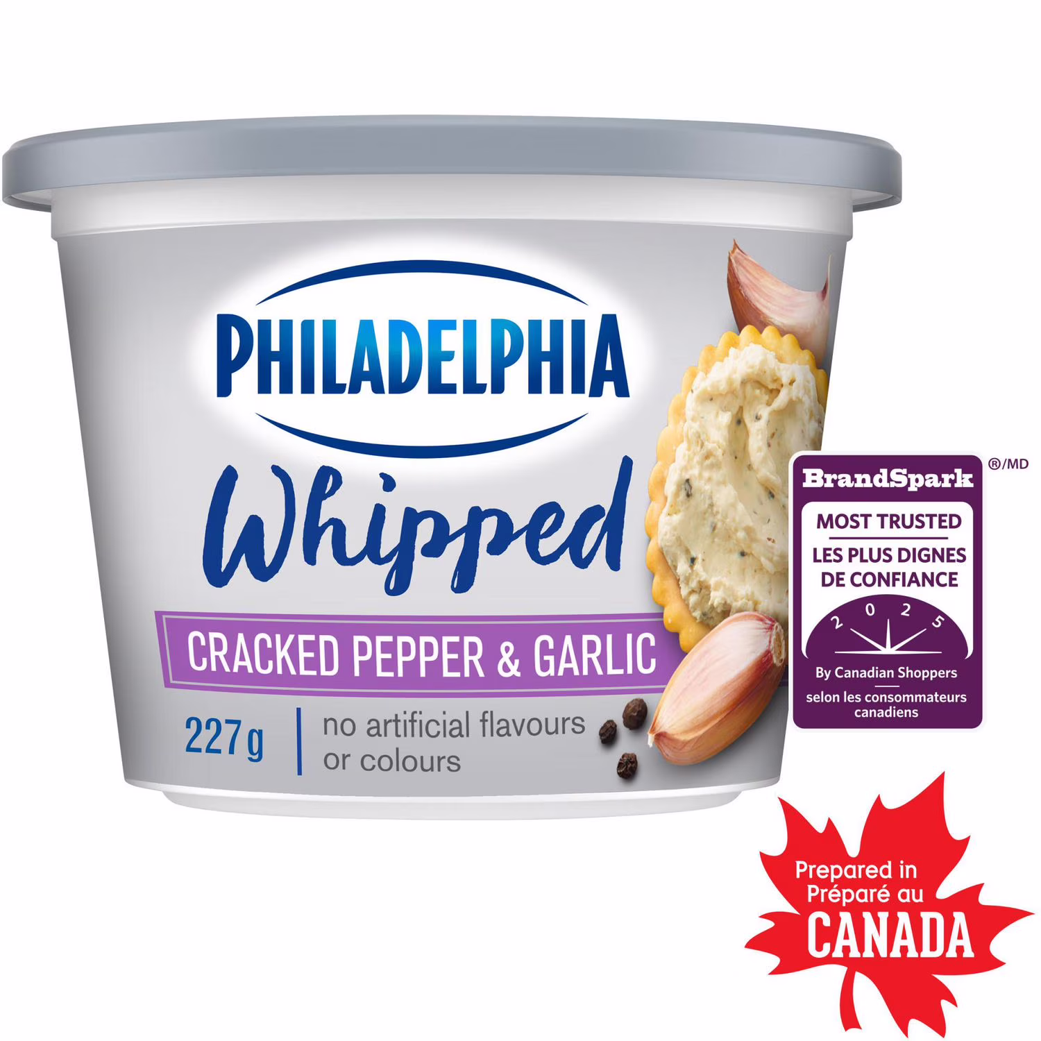 Produit de fromage à la crème philadelphia fouetté poivre concassé et ail