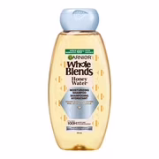 Garnier whole blends honey water shampooing hydratant. pour cheveux et cuir chevelu secs.