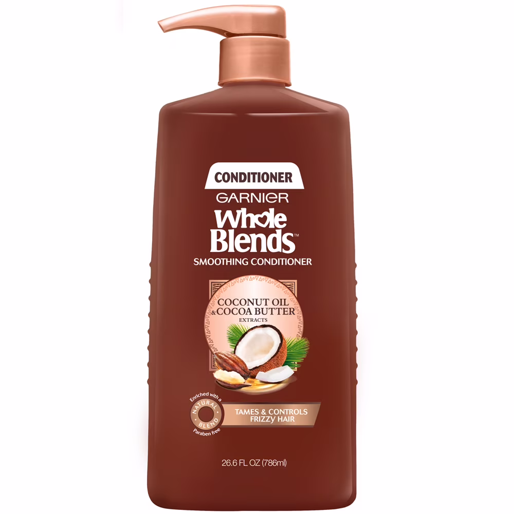 Garnier whole blends anti-frizz conditioner infused with coconut oil and cocoa butter for frizzy hair & dry hair. paraben-free.  contrôle les frisottis